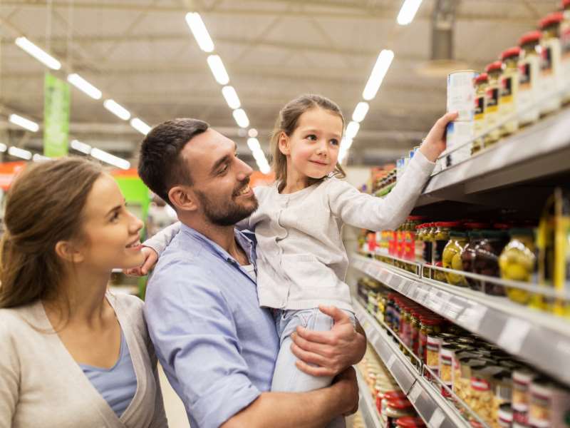 A family is shopping in a supermarket.