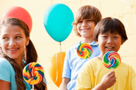 Kids eating hard-boiled candies