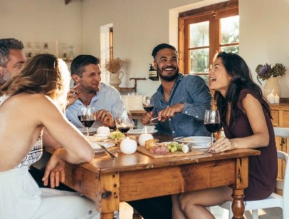 people eating and smiling together