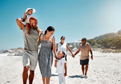 Family walking on the beach