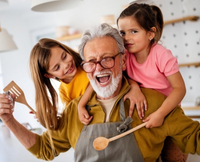 Grandfather playing with his grandchildren