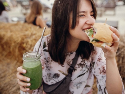 woman eating a burger