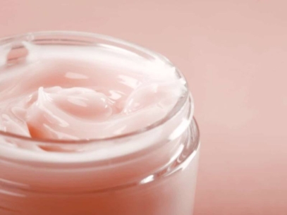 Cosmetic pink cream in a jar