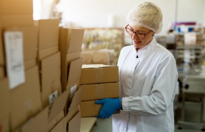 woman preparing boxes