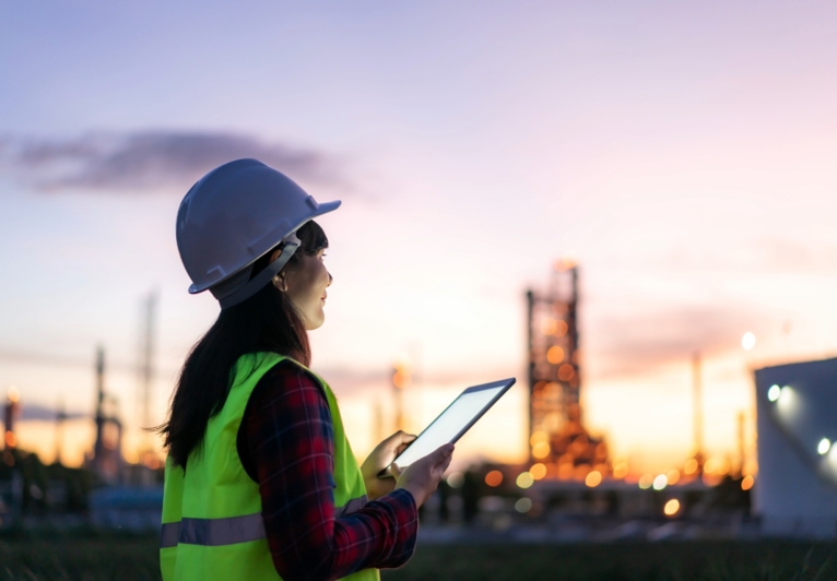 Woman looking at a manufacturing site