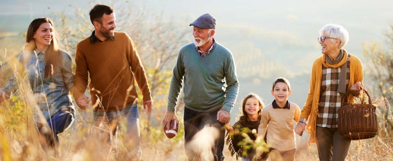 A family walking outside in the nature
