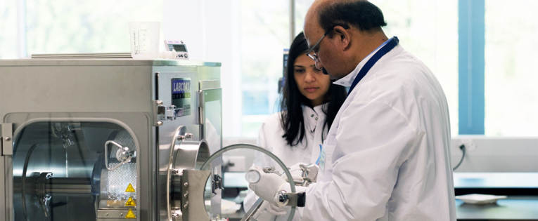 Scientists are working in a lab.