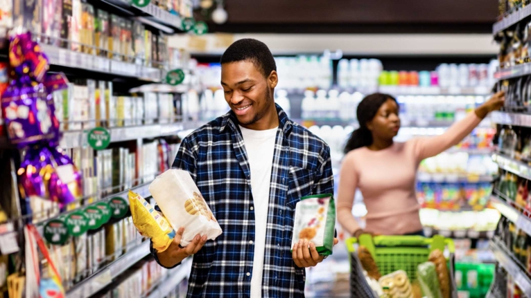 man shopping and looking at packaging